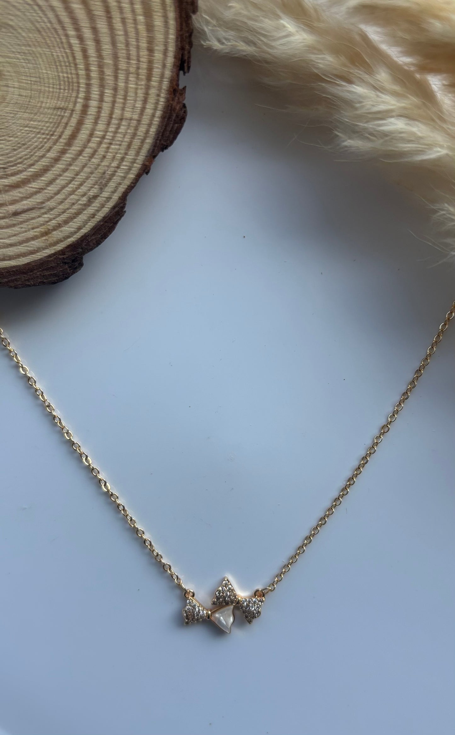 Anti tarnish gold plated double bow pendent