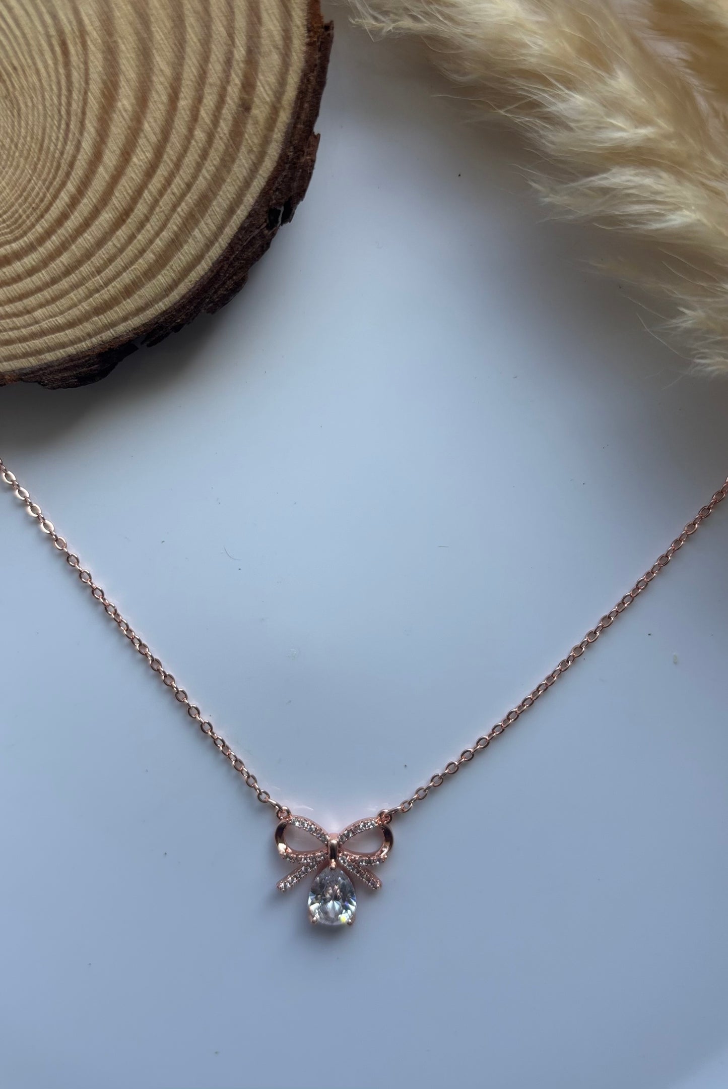 Anti tarnish rose gold plated bow with stone necklace