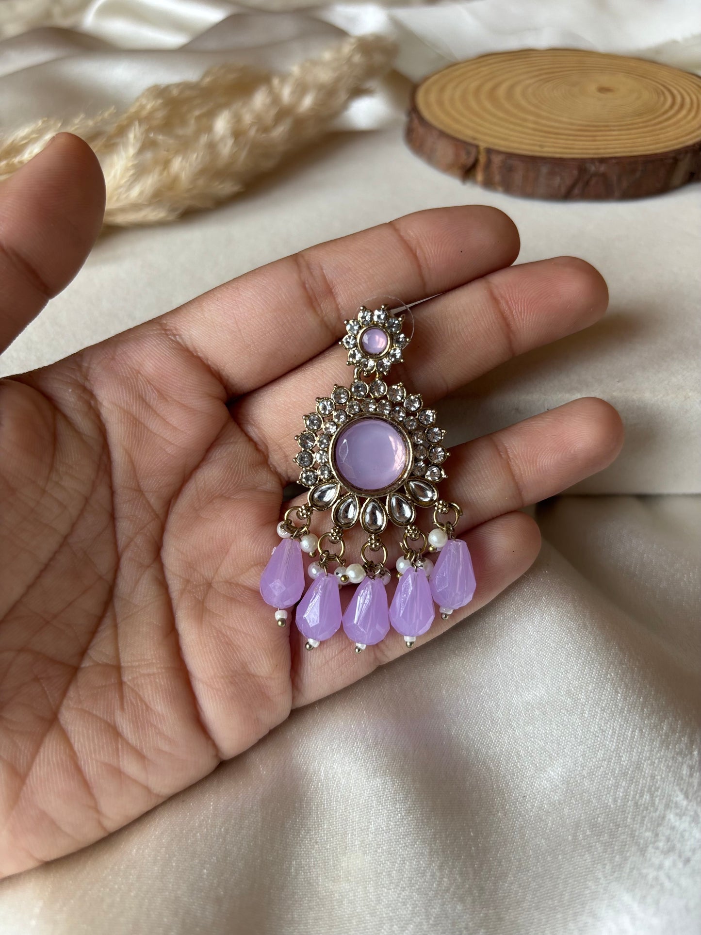 Purple jumka earrings