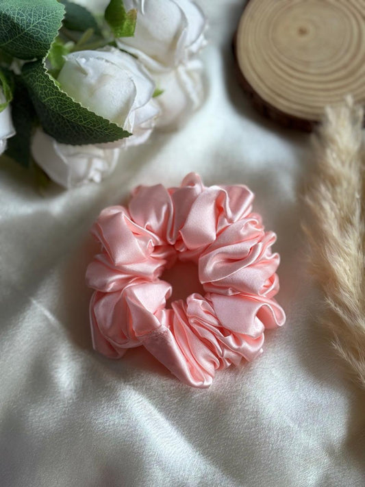 Pastel pink satin scrunchy