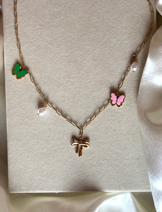 Anti tarnish gold plated bow chartm necklace