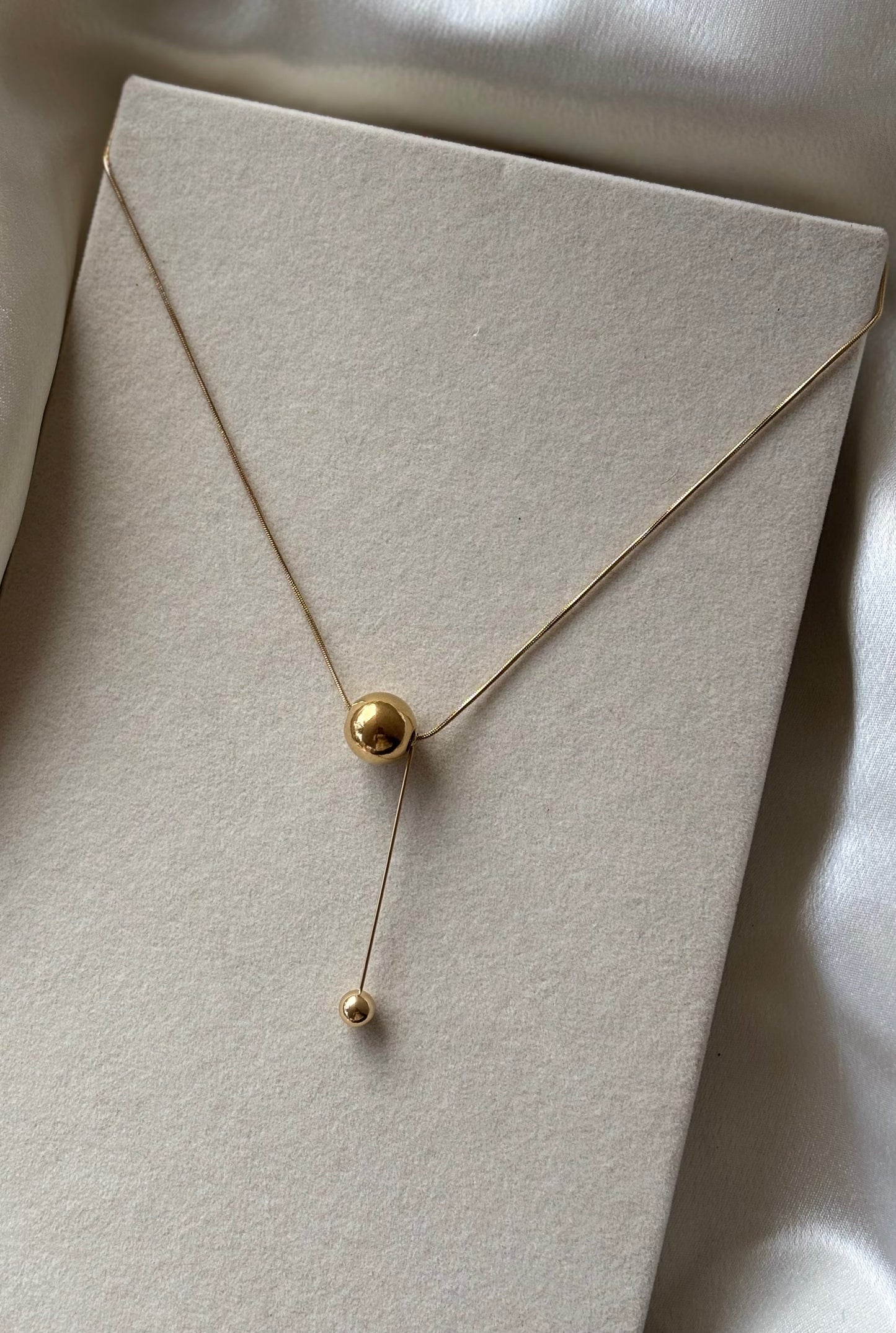 Anti tarnish gold plated ball hanging necklace