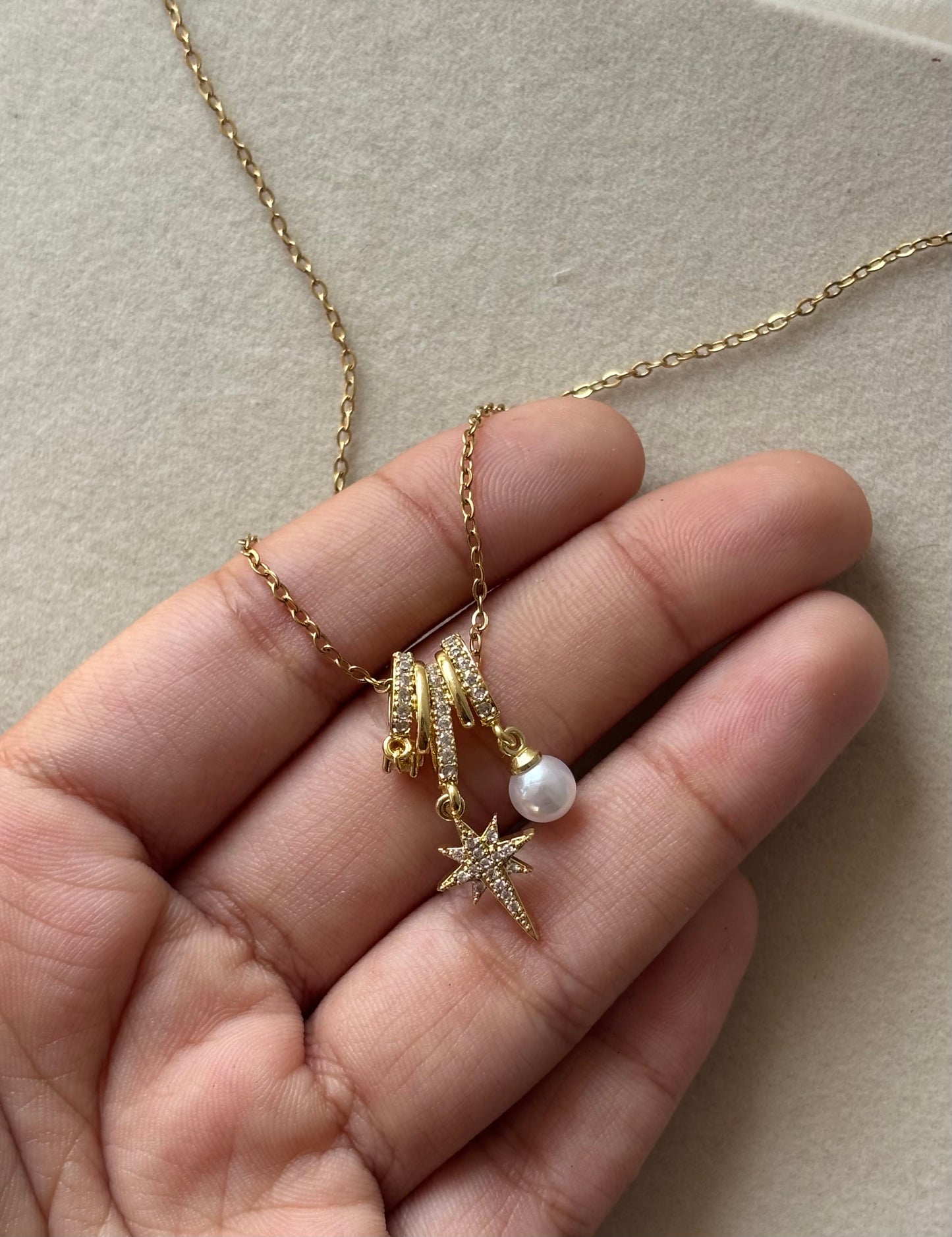 Anti tarnish gold plated star and pearl hanging necklace