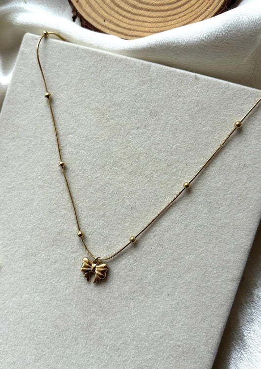Anti tarnish gold plated bow necklace