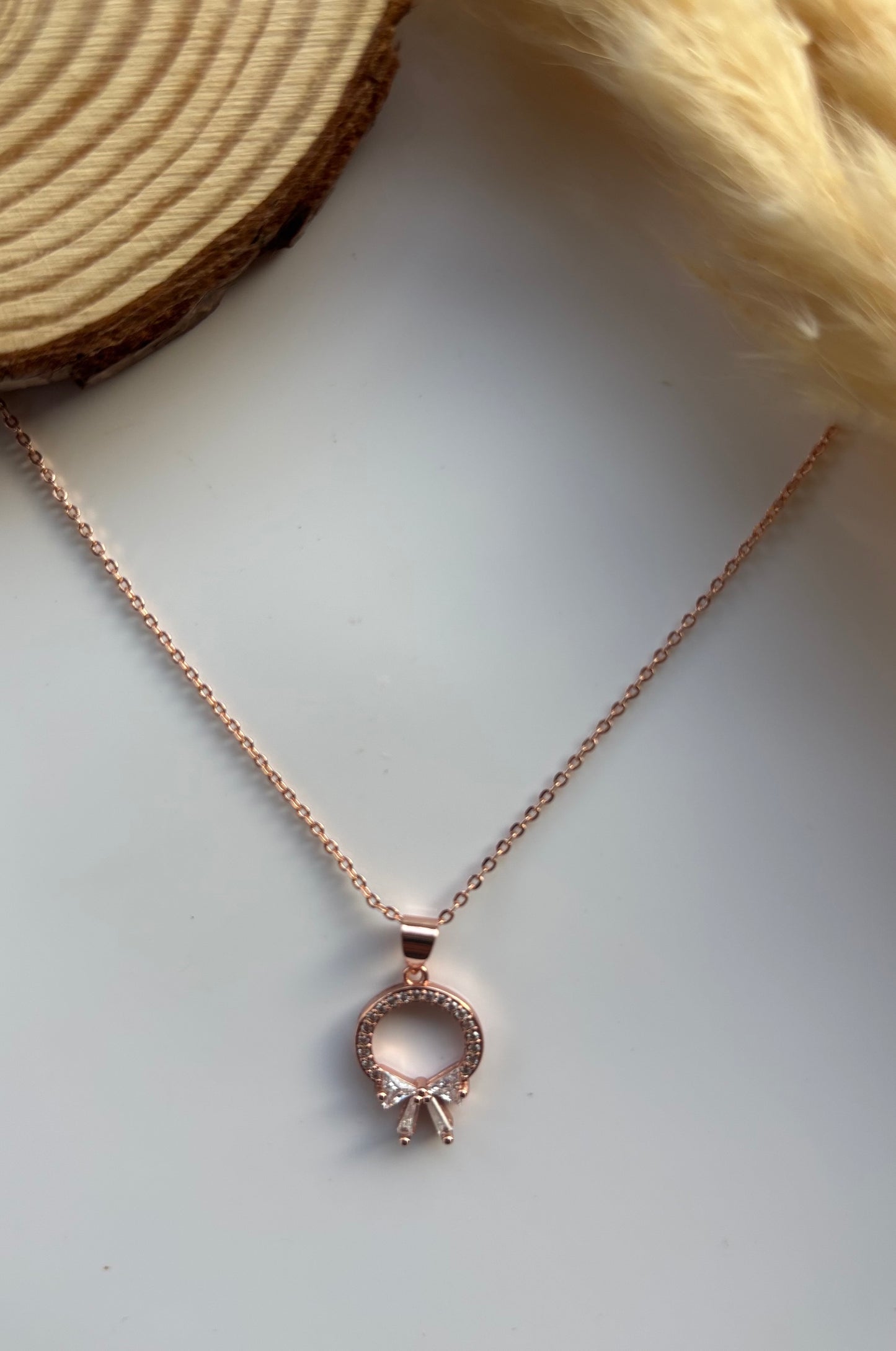 Anti tarnish rose gold plated bow stone necklace