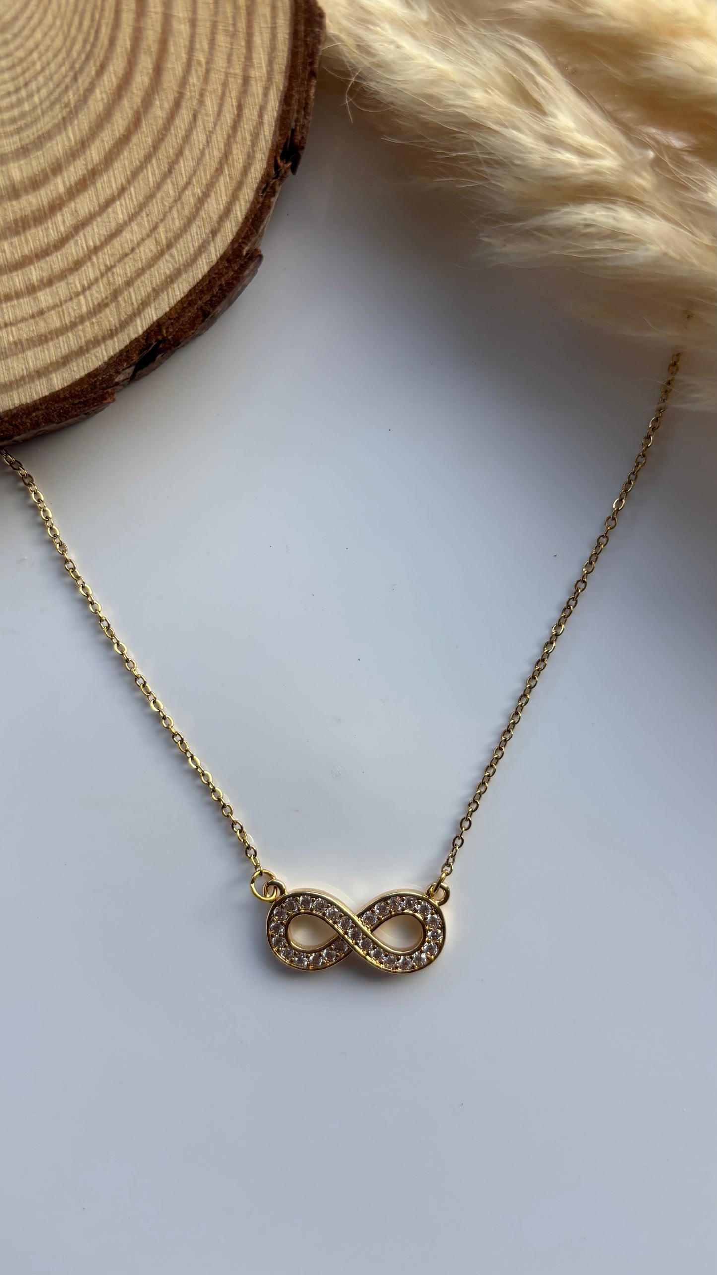 Anti tarnish gold plated stone infinity pendent