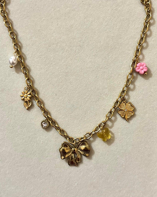 Anti tarnish gold plated bow charm necklace