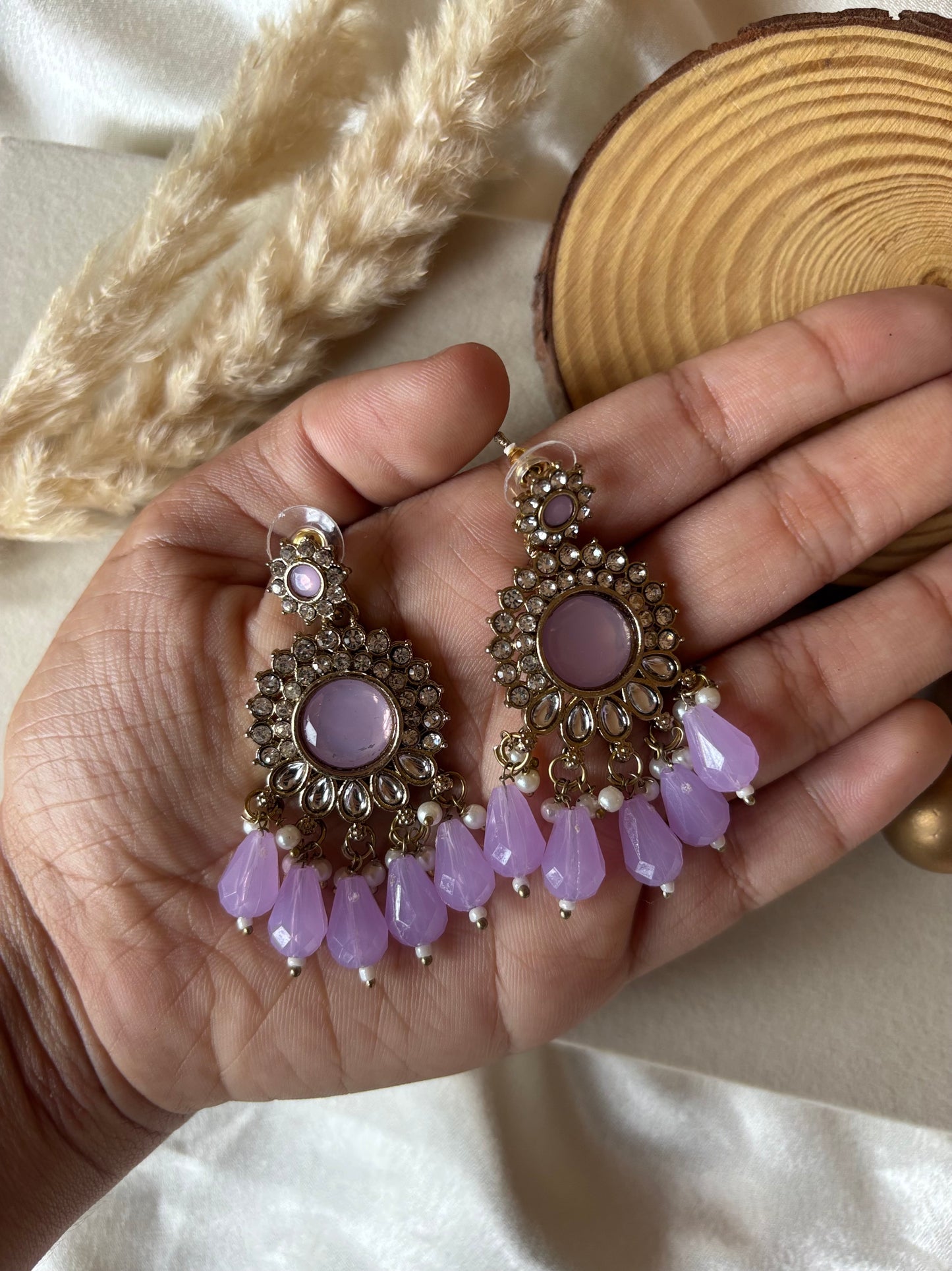 Purple jumka earrings