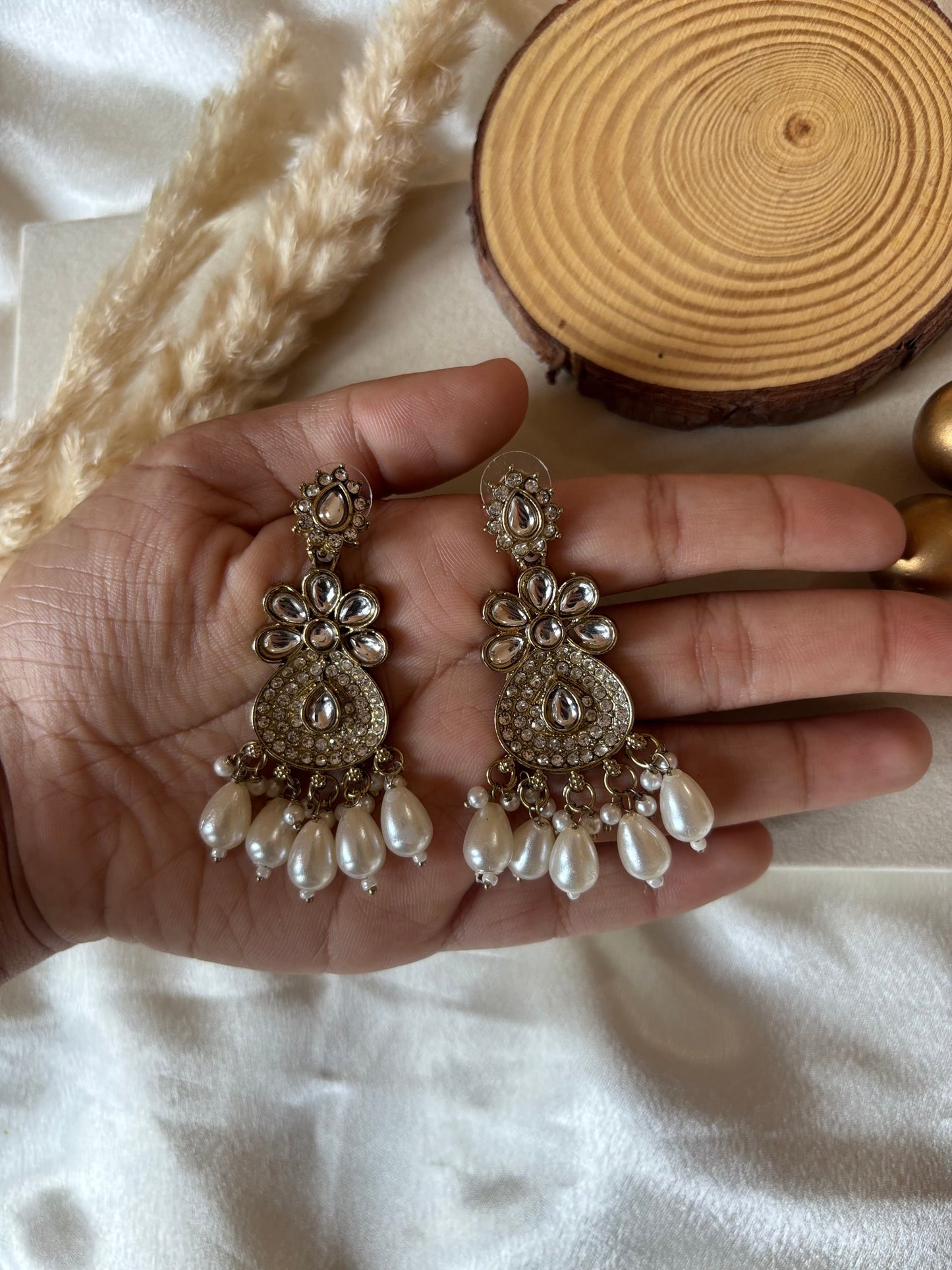 White jumka earrings
