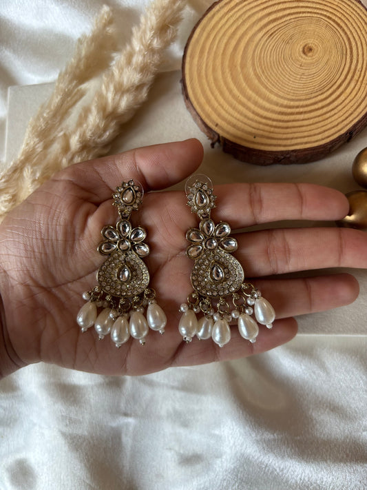 White jumka earrings